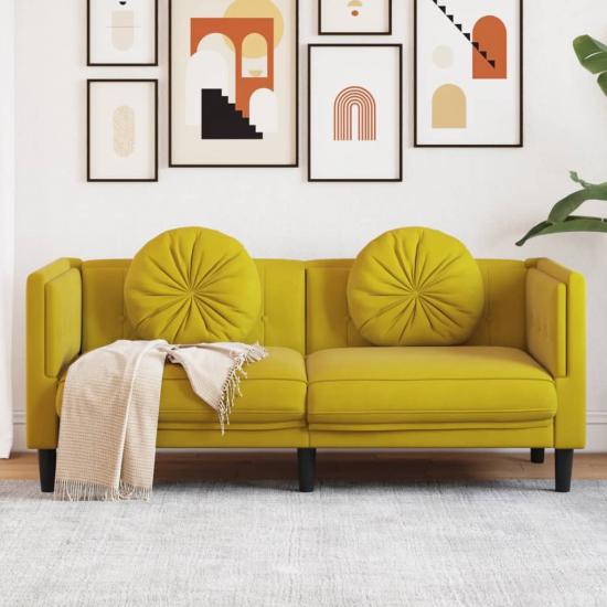 Sárga bársony kétszemélyes kanapé párnákkal