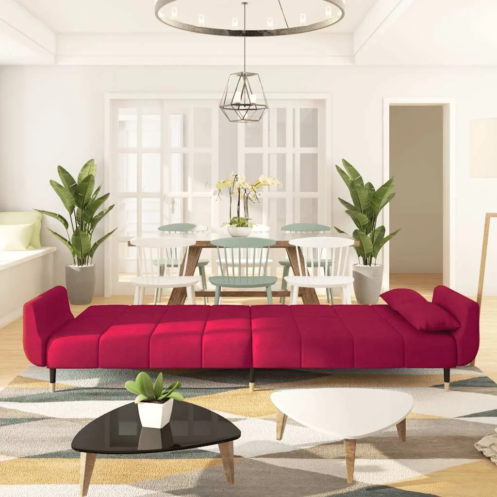 Kétszemélyes bordó bársony kanapéágy két párnával